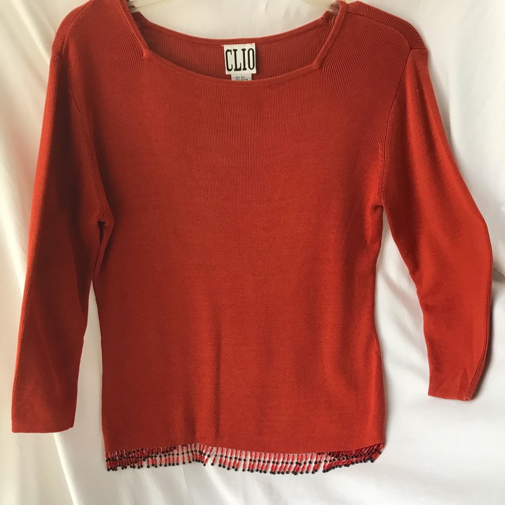 Clio, beaded rust-colored knit top